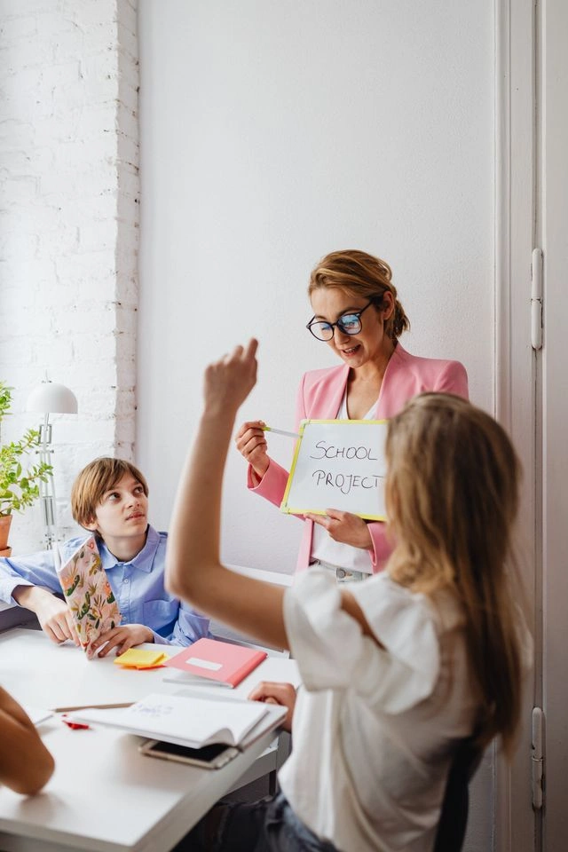Teacher leading a school project